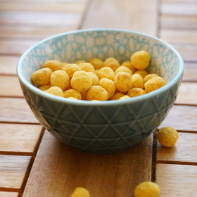 Snack salato iperproteico in forma di palline proteiche al gusto curry SG